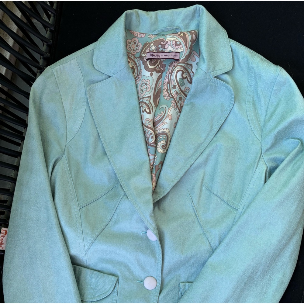 Aqua color blazer. French label.